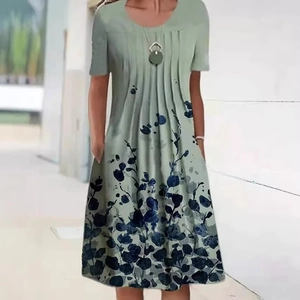 Green bohemian short sleeve dress with floral print and pleated round neckline