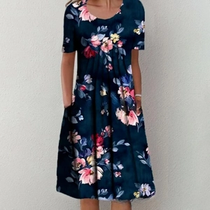 Short sleeve floral print dress in navy blue with side pockets and a round neckline