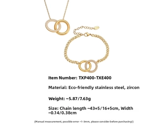 Detailansicht von Halskette und Armband Set mit Doppelringen und 18k Goldbeschichtung