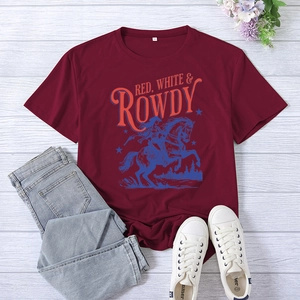 Flat lay of vintage style burgundy t-shirt with equestrian print and wood background