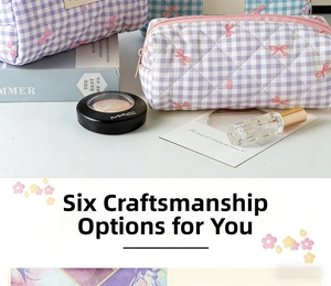 Close-up of quilted cosmetic bags with purple checkered pattern and pink bow embroidery