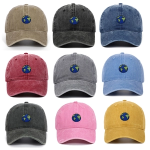 Macro display of assorted colors for the washed cotton baseball cap with earth embroidery