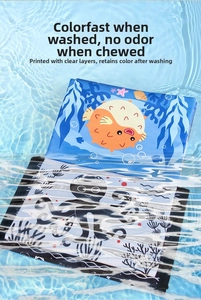 Waterproof marine baby cloth book featuring colorful pufferfish and octopus in water