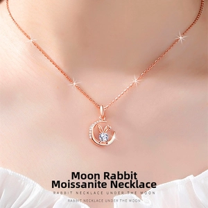 Macro view of Rabbit on the Moon moissanite pendant necklace on s925 silver rose gold chain
