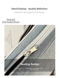 Detail shot of sturdy silver metal zipper closure on the grey and white canvas tote bag