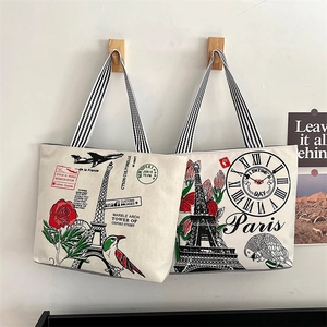 Floral Paris Eiffel Tower canvas tote bag with striped straps and vintage French print