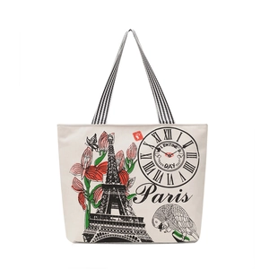 Eiffel Tower print canvas tote bag with striped straps and vintage floral Paris design