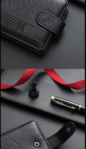 Detail einer schwarzen Herrenbörse aus Leder mit Metalldruckknopf und Business-Zubehör