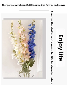 Macro detail of artificial delphinium flowers in white, pink and blue with green buds