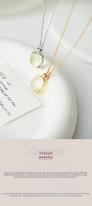 Detailed close-up of sugarloaf cut green quartz pendant on S925 silver chain necklace