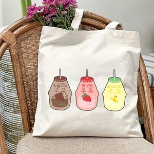 Detail of white canvas tote bag featuring cute Korean cartoon drink bottle prints