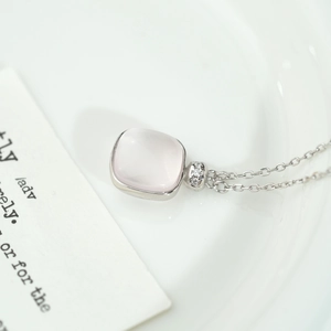 S925 sterling silver necklace with a square pink quartz pendant and small zircon stones