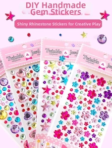 Macro detail of colorful 3D crystal gem stickers in heart and star shapes for DIY crafts