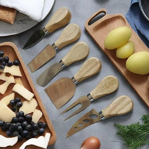 Detailed set of six stainless steel cheese knives with ergonomic wooden handles