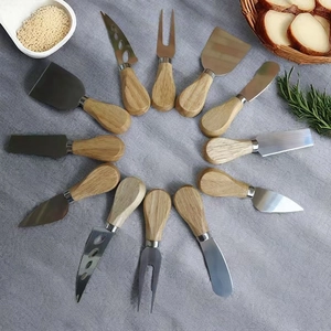 12-piece stainless steel cheese knife set with wooden handles arranged in a circle