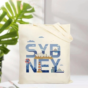 Off-white canvas tote bag featuring Sydney city illustrations and durable shoulder straps