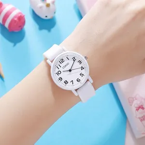 Minimalist white silicone quartz watch for students with analog display and round dial