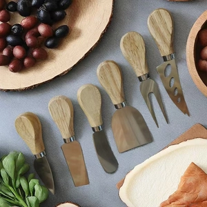 Detailed set of six stainless steel cheese knives with ergonomic natural wood handles