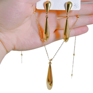 Minimalist gold teardrop pendant necklace and earring jewelry set with smooth mirror finish