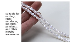 Close-up of natural white baroque pearls with glossy finish for DIY jewelry making
