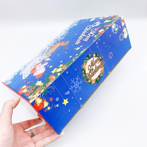 Blue rectangular Christmas gift box with Merry Christmas text and festive reindeer patterns