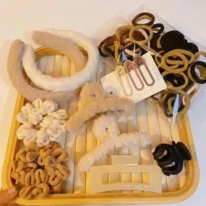 67-piece hair accessory set featuring plush headbands, scrunchies, clips and 100 hair ties