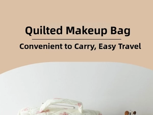 Detailed close-up of a quilted floral makeup bag featuring a soft padded handle and bow design