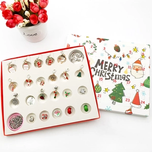 Detailed Christmas advent calendar box with festive DIY charms and jewelry pieces