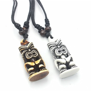 Polynesian Tiki pendant necklace with bone-like resin and adjustable black cord