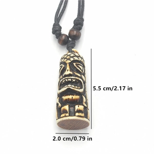 Detailed size view of resin Tiki totem pendant measuring 5.5 cm with adjustable cord