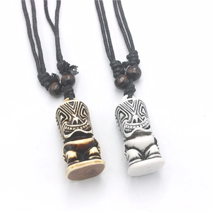 Polynesian Tiki pendant necklace set in bone white and wood brown resin styles