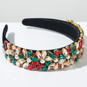 Detailed close-up of Baroque velvet headband with multi-color jewels and pearls