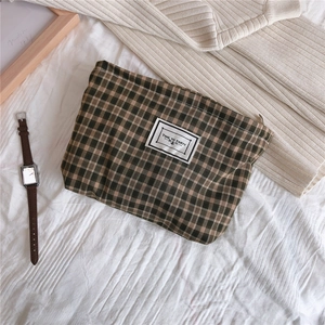 Vintage British plaid fabric pouch with Time to Party label and top zipper closure