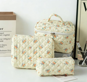 Three-piece quilted cotton floral makeup bag set with vintage flower pattern and handles