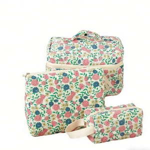 Floral quilted cotton makeup bags set of three in pink blue and yellow floral patterns