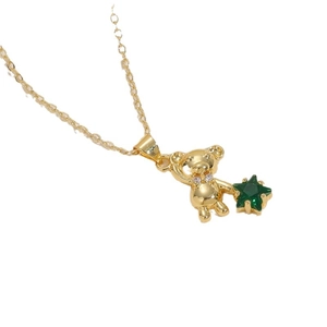 Gold bear necklace with a green star zircon pendant on a dainty cable chain