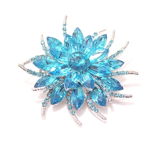 Elegant bauhinia flower brooch with sky blue crystals on a minimalist silver alloy base