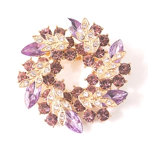 Elegant purple crystal flower wreath brooch with gold base and marquise cut stones