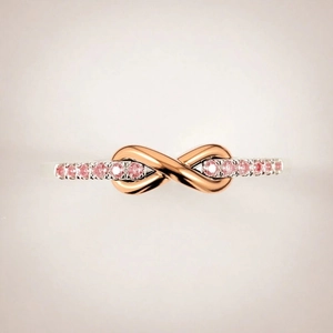 Infinity rose gold ring with pink sapphires and adjustable pave setting for women
