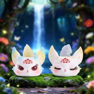 Creative fox scent stone figures with mineral crystals on mossy forest rocks