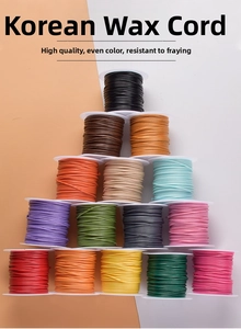Detail of 1.0mm Korean waxed cord spools in 15 vibrant colors for DIY jewelry making