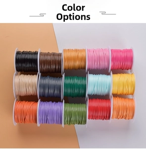 Detailed close-up of 15 colorful 1.0mm waxed polyester cords wound on plastic spools