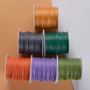 Set of six colorful 1.0mm waxed polyester cords on white spools for DIY jewelry making