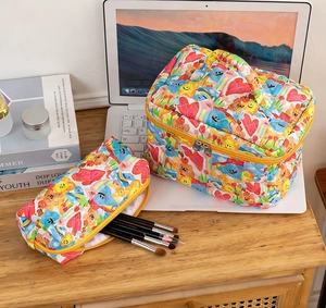 Quilted cotton makeup bag set with colorful graffiti patterns and zip closure