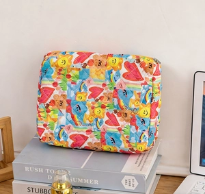 Quilted cotton makeup bag with colorful cartoon sun, bear and heart patterns and zipper
