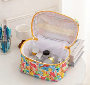 Quilted makeup bag with colorful prints showing internal mesh pocket and large capacity