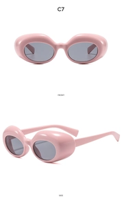 Detailansicht der rosa ovalen Sonnenbrille von vorne und der Seite mit grauen Gläsern