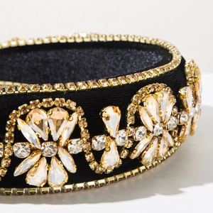 Detail of luxury baroque headband with champagne crystals and floral hand-sewn beads