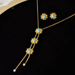 Vintage Blumen Schmuckset mit Türkis Halskette und Ohrringen in goldener Ausführung