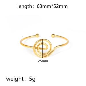 Detailed view of golden knotted knot bracelet with swirl spiral design and size specs